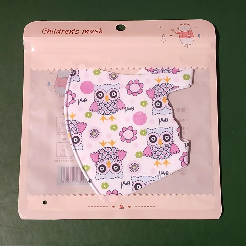 Children's re Usable face mask new in package never opened